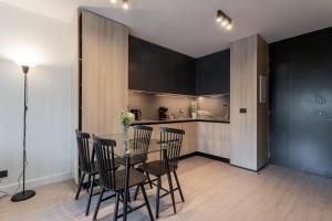 Charming 1BR Retreat Close To Parque Arauco Mall廚房或簡易廚房