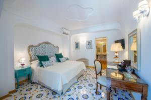 Postel nebo postele na pokoji v ubytování Hotel Onda Verde