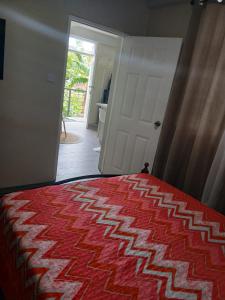 Un ou plusieurs lits dans un hébergement de l'établissement Cypress Suites