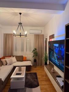 TV a/nebo společenská místnost v ubytování Apartman Golden Crown