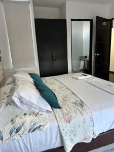 Postel nebo postele na pokoji v ubytování hotel royal fenix