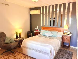 Letto o letti in una camera di CASA BELLE VUE sea view & private pool