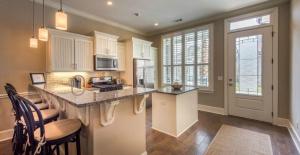 Køkken eller tekøkken på Poolside Cottage 33