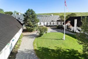 an aerial view of a building with a yard at Surfreservatet i Nationalpark Thy in Hanstholm