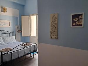 Postel nebo postele na pokoji v ubytování La casa di Aneupe