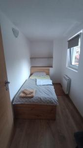 Postel nebo postele na pokoji v ubytování Apartma Zora