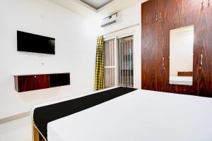 Foto Bangalore’is asuva majutusasutuse Hotel O Sri Vishnu Prime Opposite The Studio Salon, Kundalhalli Gate galeriist +23 fotot