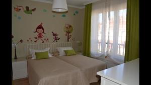 Ένα ή περισσότερα κρεβάτια σε δωμάτιο στο Precioso chalet en un entorno inmejorable +8 φωτογραφίες