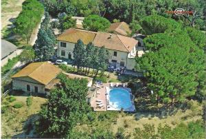 an aerial view of a house with a swimming pool at La Pievaccia in Binami