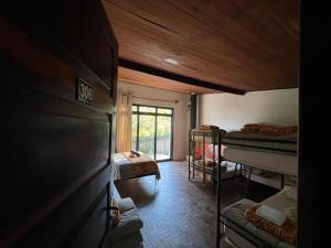 Postel nebo postele na pokoji v ubytování Hostel Picus