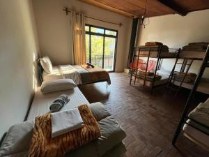 Postel nebo postele na pokoji v ubytování Hostel Picus