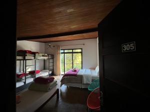 Postel nebo postele na pokoji v ubytování Hostel Picus