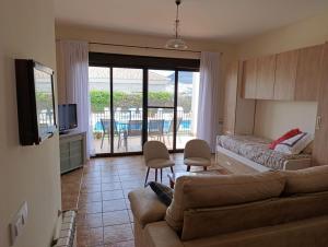 TV a/nebo společenská místnost v ubytování Apartamento Las Golondrinas - Rute - Córdoba