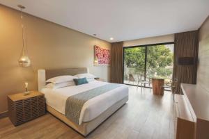 The Yucatan Playa Del Carmen, Tapestry Collection By Hilton客房内的一张或多张床位