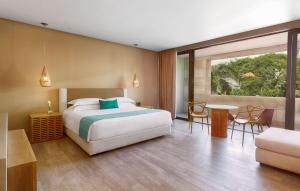 The Yucatan Playa Del Carmen, Tapestry Collection By Hilton客房内的一张或多张床位