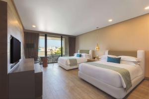 The Yucatan Playa Del Carmen, Tapestry Collection By Hilton客房内的一张或多张床位