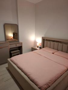 Postelja oz. postelje v sobi nastanitve Nio Planet Villa Golem, Durrës