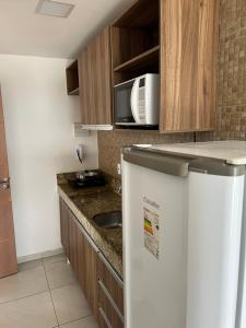 Køkken eller tekøkken på Flat alto padrão na melhor localização da cidade