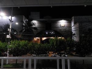 Vrt pred nastanitvijo Posada Cocos Place