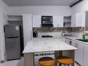 Kuhinja oz. manjša kuhinja v nastanitvi Posada Cocos Place