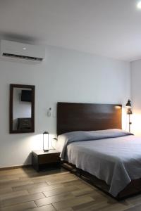 Postel nebo postele na pokoji v ubytování Lofts Las Fuentes