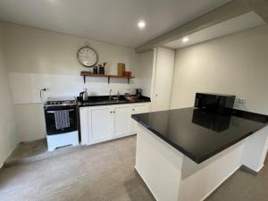 Kuchyň nebo kuchyňský kout v ubytování Apartamento aconchegante na Colônia Witmarsum + 8 fotografií