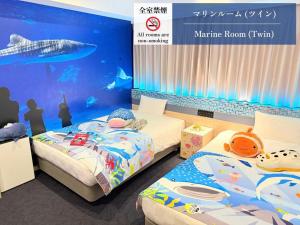 Postel nebo postele na pokoji v ubytování Henn na Hotel Premier Kagoshima Tenmonkan + 37 fotografií
