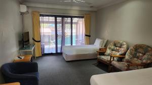 T's Resort & Motel客房内的一张或多张床位