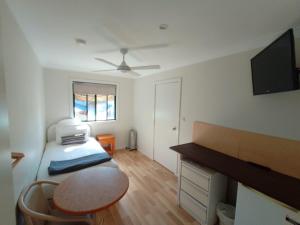 T's Resort & Motel客房内的一张或多张床位