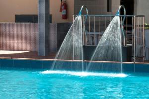 Πισίνα στο ή κοντά στο Hotel Dan Inn Express Foz do Iguaçu By Nacional Inn