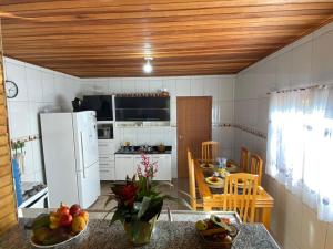 Una cocina o cocineta en Aconchego de Mauá