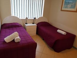 Postel nebo postele na pokoji v ubytování Cabarita Beachfront Ocean View 12