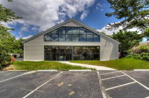 a building with a lot of windows in a parking lot at Spacious Gatlinburg Condo With Million Dollar Mountain Views in Gatlinburg