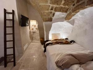 Postel nebo postele na pokoji v ubytování LA SEGRETA DEL CASTELLO, Private Access