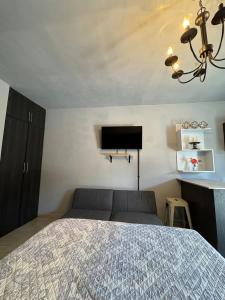 Μια τηλεόραση ή/και κέντρο ψυχαγωγίας στο Estancias Nava #4