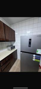Η κουζίνα ή μικρή κουζίνα στο Deluxe Direct Nile Apartment