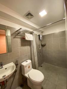 Ένα μπάνιο στο Kaizen Suites