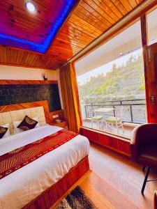 Voodi või voodid majutusasutuse Himalayan Valley View Resort - Rooms with Balcony and mountain view - Peacefull place - Private Parking - Easy Access toas