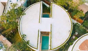 an overhead view of an empty swimming pool at 2 Tropical Bohemian Villas-2 Priv Pool-BBQ 3A-3B in Tulum +52 photos