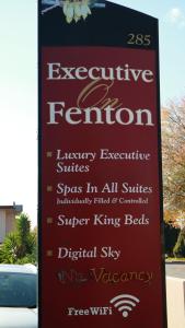 a sign for aenective reunion on a parking lot at Executive On Fenton in Rotorua