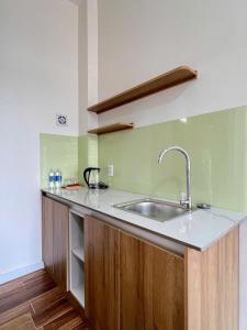 Kuchyň nebo kuchyňský kout v ubytování Wonder House Dalat