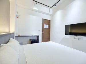 庇琺行旅民宿客房内的一张或多张床位