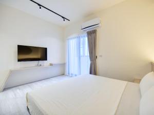 庇琺行旅民宿客房内的一张或多张床位