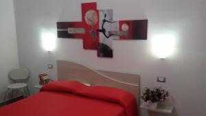 Postel nebo postele na pokoji v ubytování B&B HF Fiorella