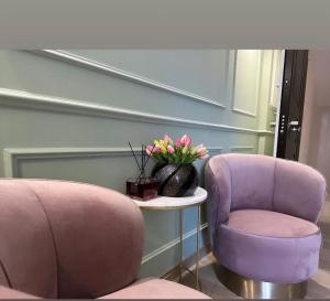 A seating area at Nouvelle Maison Rome Luxury Palace