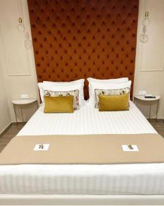 Posteľ alebo postele v izbe v ubytovaní Nouvelle Maison Rome Luxury Palace