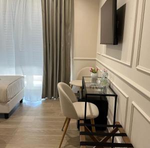 A seating area at Nouvelle Maison Rome Luxury Palace