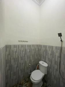 Koupelna v ubytování YF Homestay Jepara