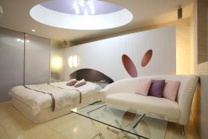 Posezení v ubytování Hotel ASH ホテル アッシュ