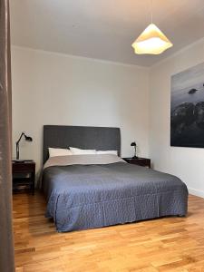 Postel nebo postele na pokoji v ubytování Stor lägenhet i centrala Karlshamn!